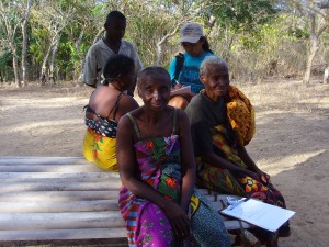 Sylviane conducting questionnaires and surveys in a village in Madagascar.